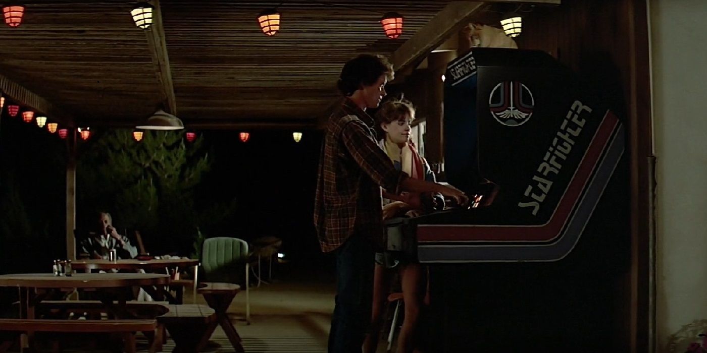 Two kids playing the Starfighter arcade game in The Last Starfighter.