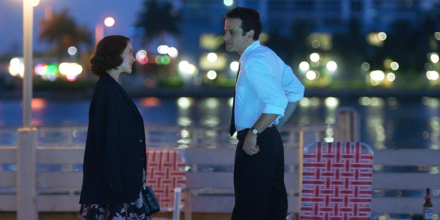 Midge and Lenny outside talking by the water in a scene from The Marvelous Mrs. Maisel.