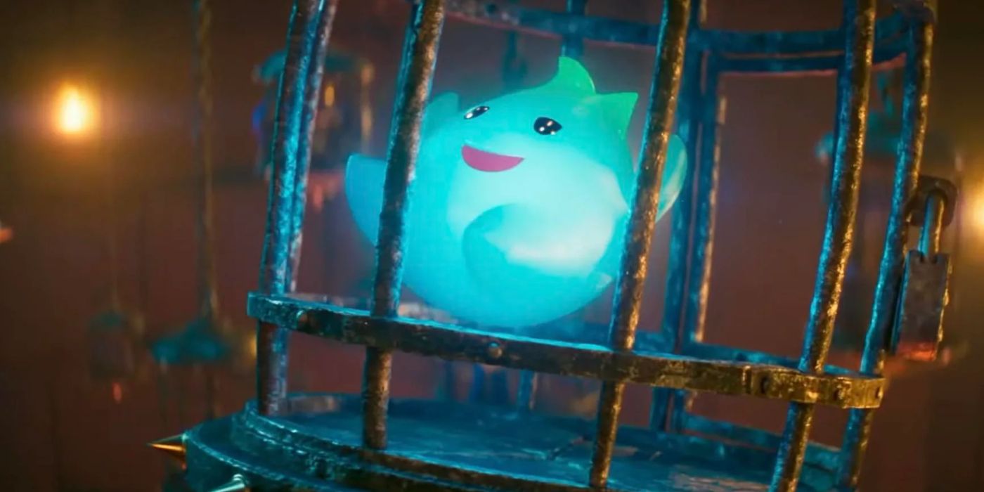 Lumalee sorrindo e chacoalhando em uma gaiola no filme Super Mario Bros.