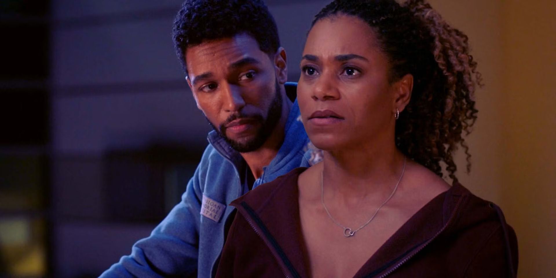 Winston Ndugu (Anthony Hill) looks at Maggie Pierce (Kelly McCreary) staring off in Grey's Anatomy