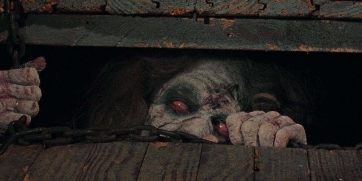 A possessed Deadite is in a chained cellar from the original Evil Dead movie