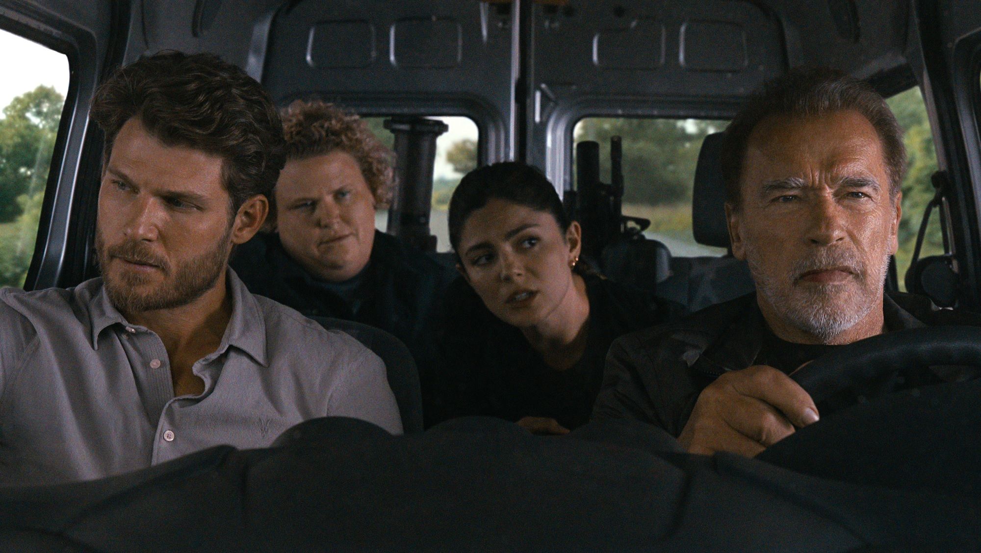 Aldon, Roo, Emma and Luke in a van in FUBAR