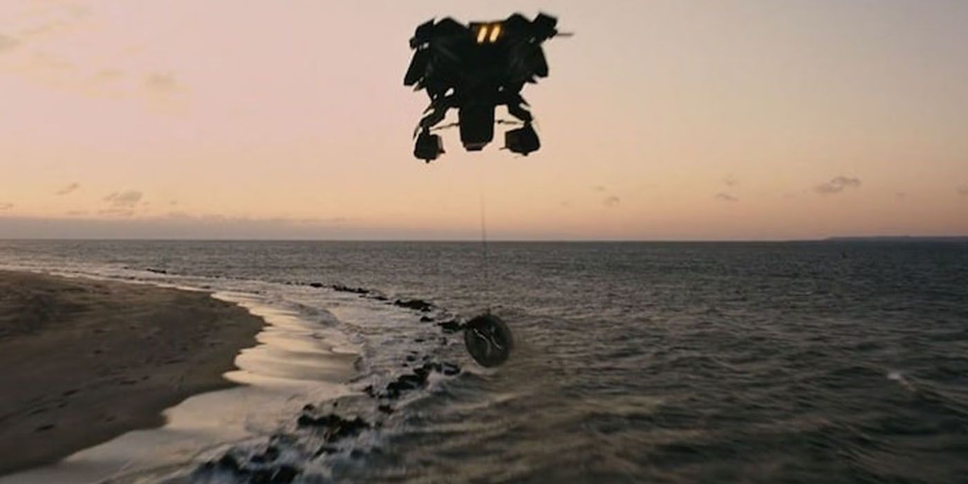Batman flying the bomb over the sea and away from Gotham in the Bat.