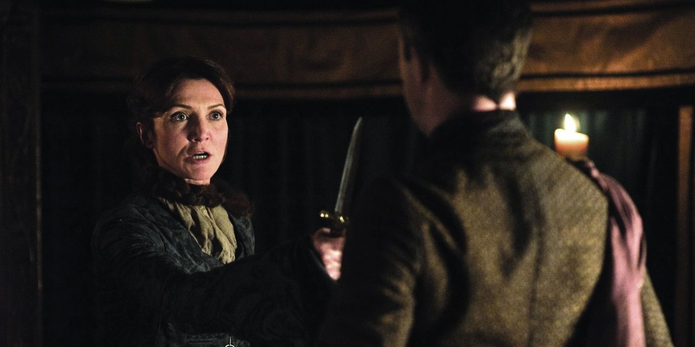 Catelyn Stark brandishing a dagger at Littlefinger in Game of Thrones