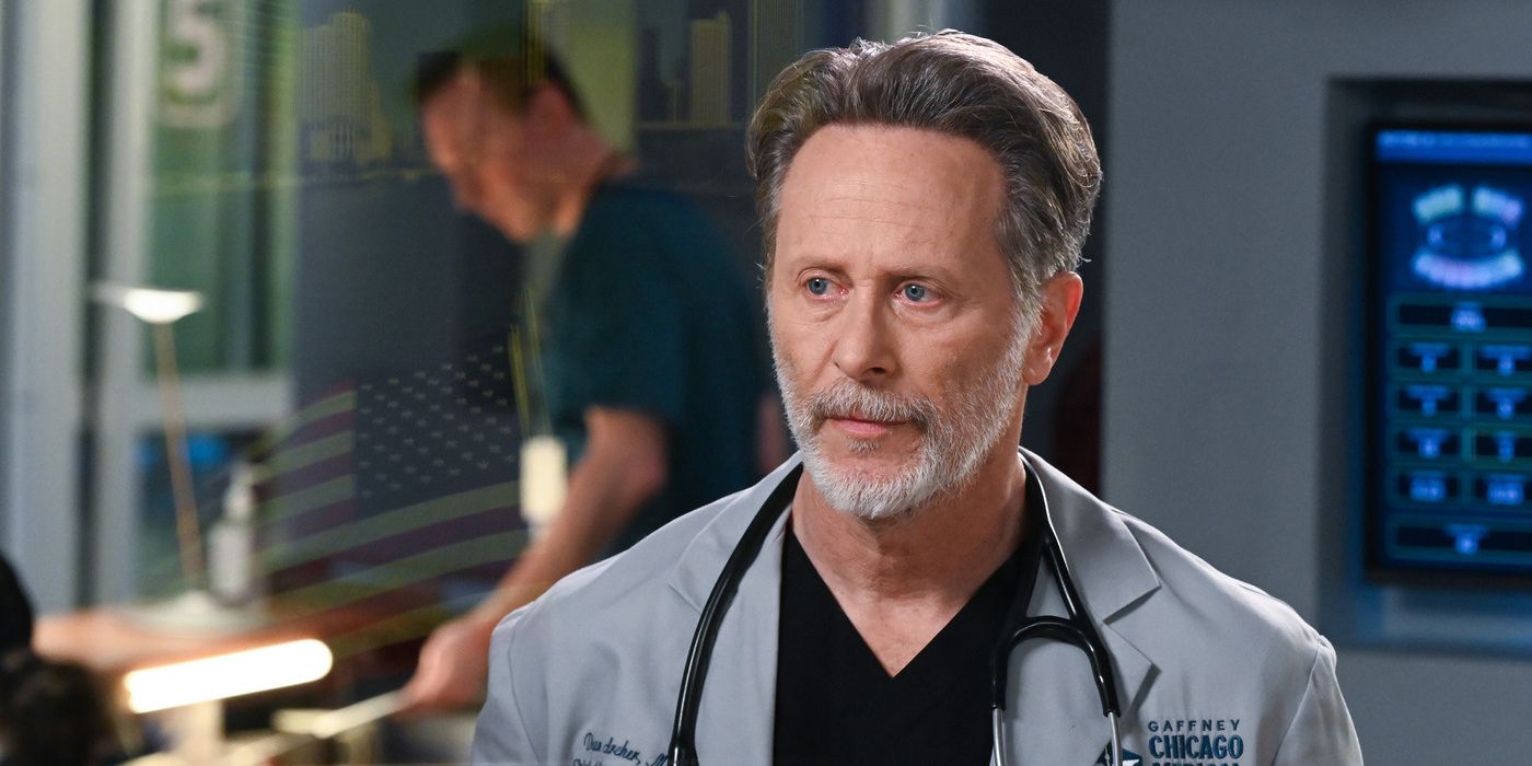 Chicago Med's Dr. Dean Archer, played by Steven Weber. in a lab coat in the ED