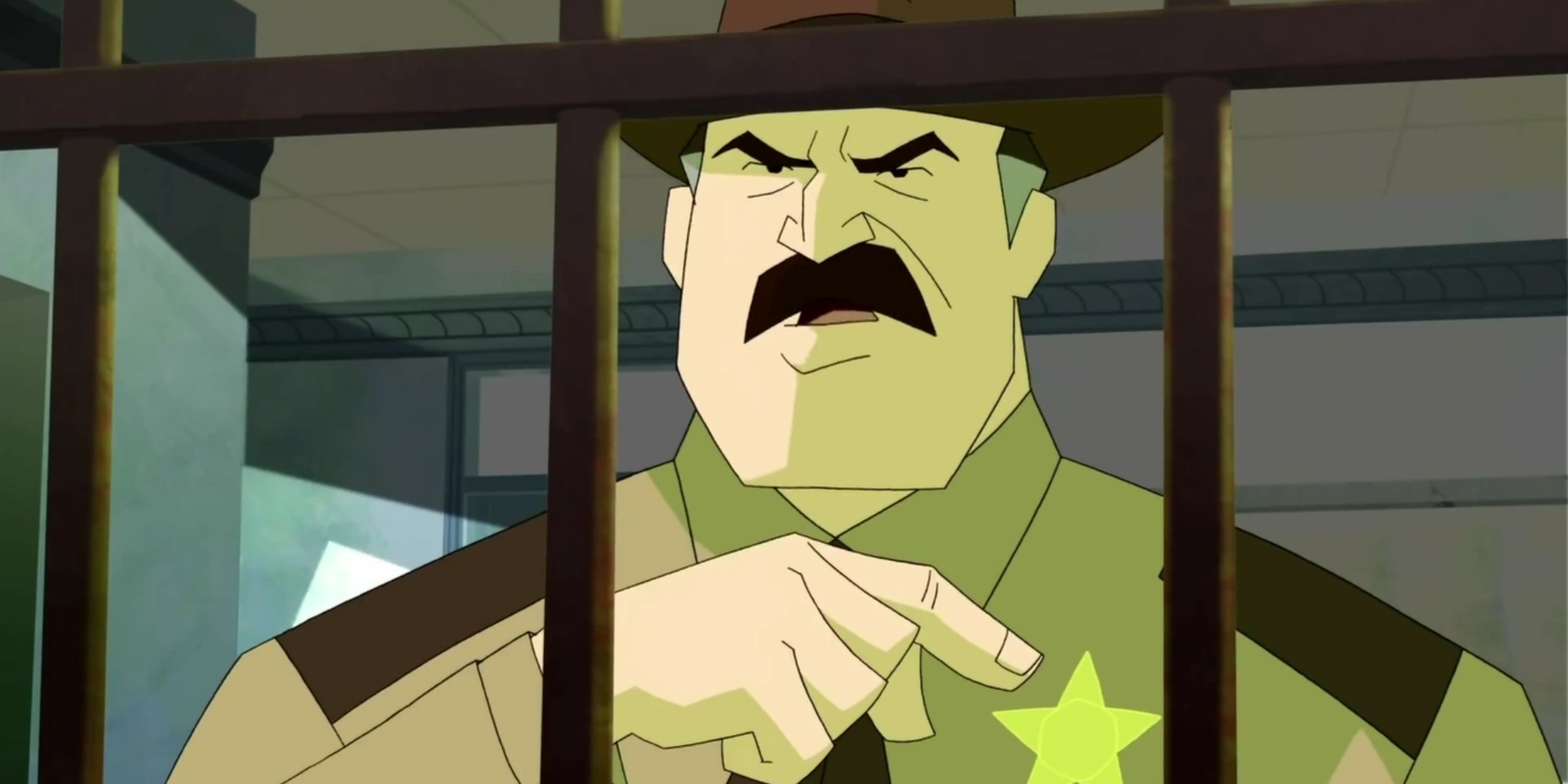 Sheriff Stone points to his badge in Mystery Incorporated