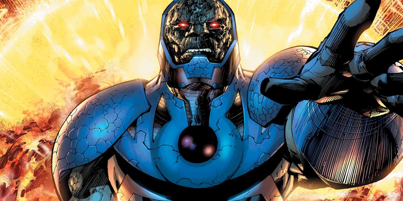 Darkseid holds out a hand in front of an explosion in DC Comics.