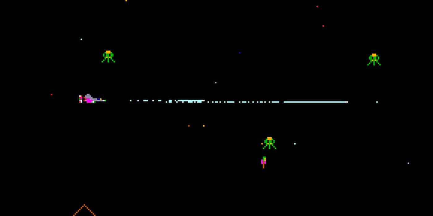 A player shooting at alien ships in Defender video game.