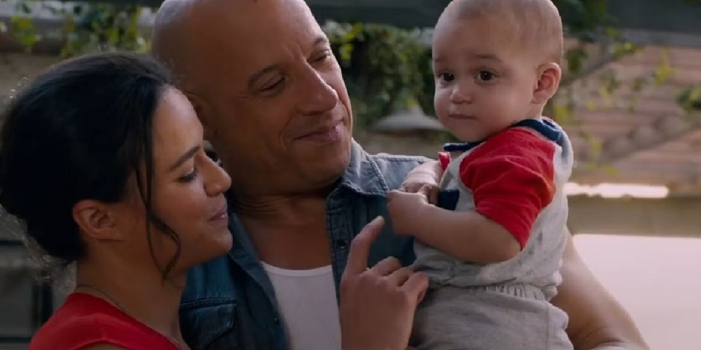 Dominic Toretto (Vin Diesel) and Letty Ortiz (Michelle Rodriguez) with their son Brian in Fast X