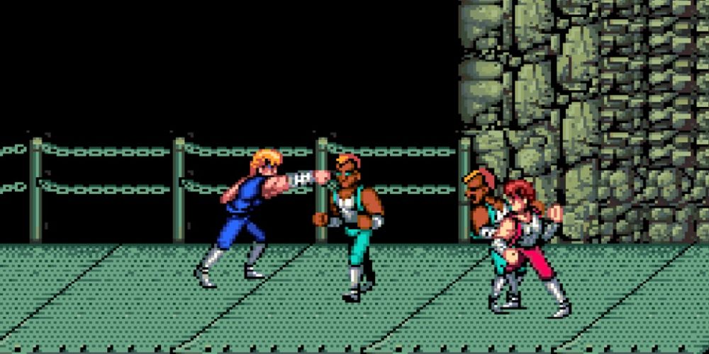 Dois jogadores lutando contra inimigos no jogo de arcade Double Dragon.