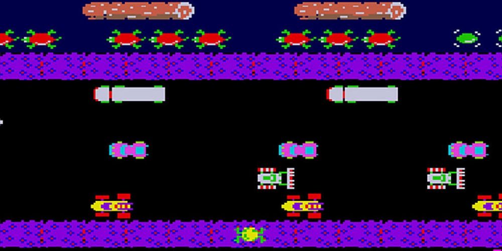 Um jogador tentando atravessar a rua no jogo de fliperama Frogger.