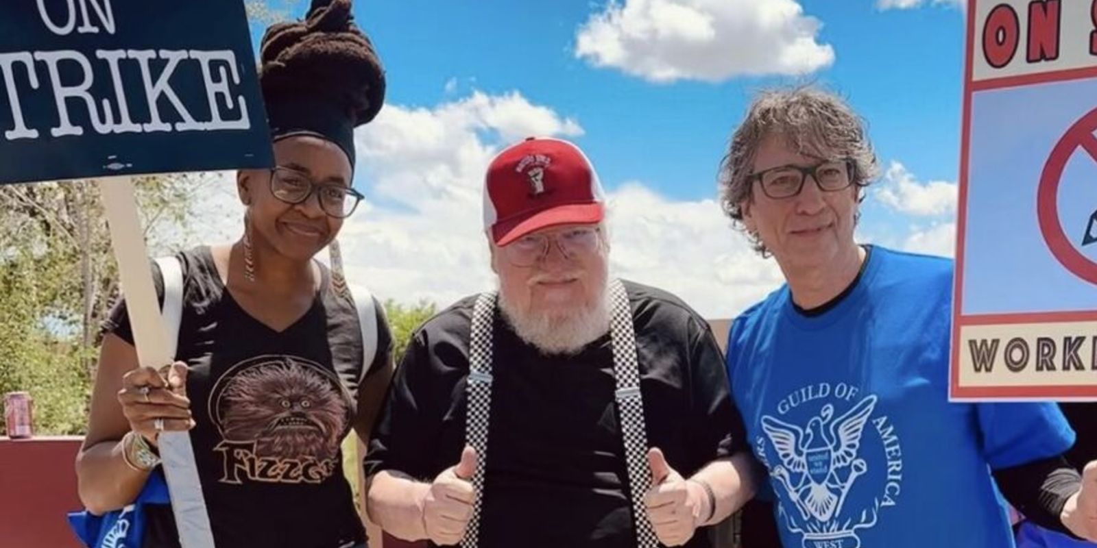 nnedi okorafor, george r.r. martin, and neil gaiman standing at the picket line in support of the wga strike