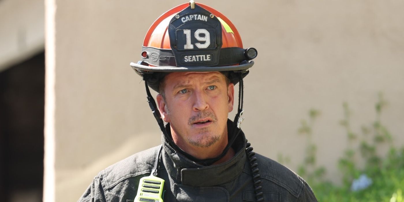 Sean Beckett wears uniform and Captain helmet in Station 19