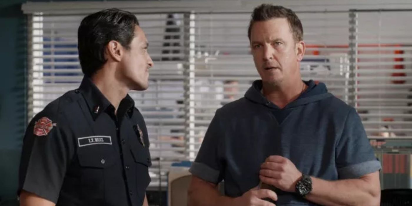 Captain Sean Beckett stands next to Theo Ruiz in the firehouse office in Station 19