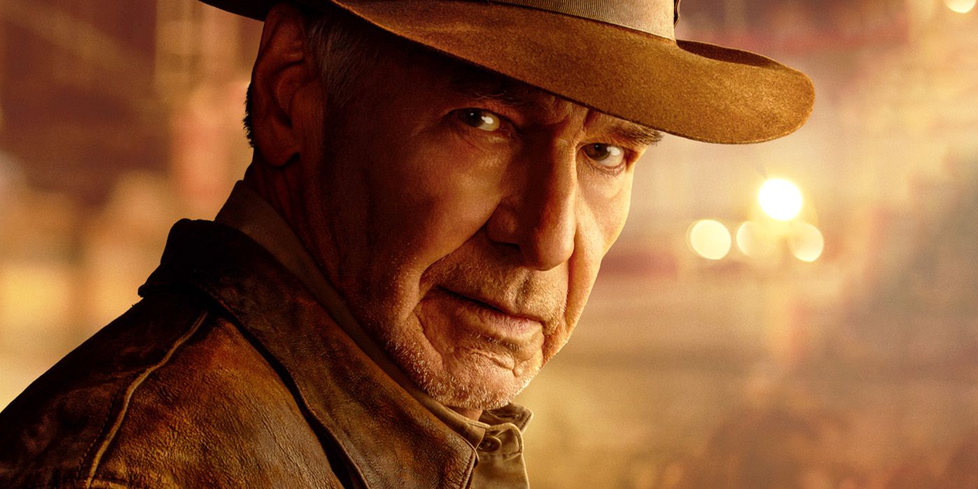 Harrison Ford as Indiana Jones in Dial of Destiny looking at the camera.