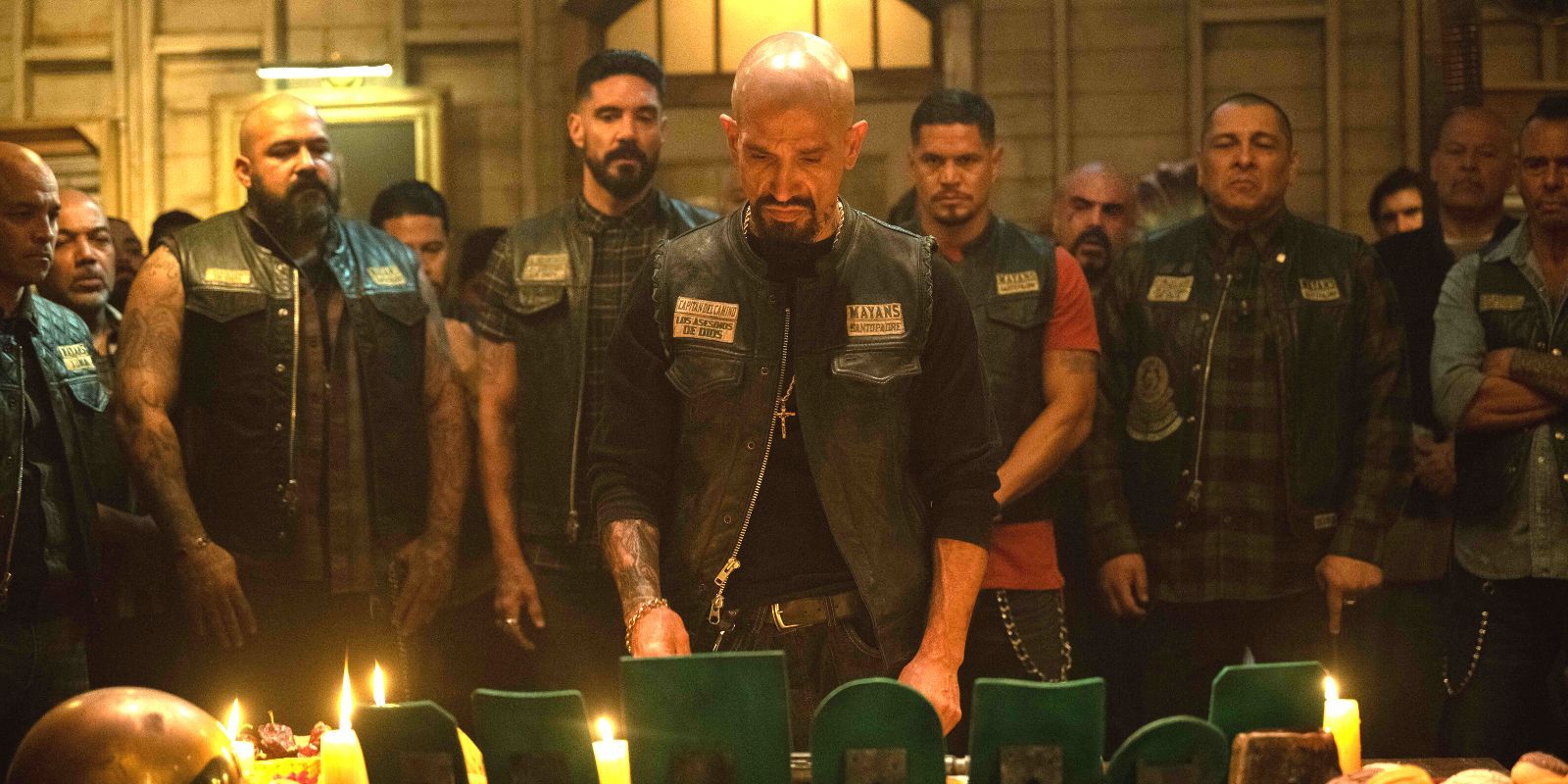 The Mayans MC gather around for a candlelight funeral.