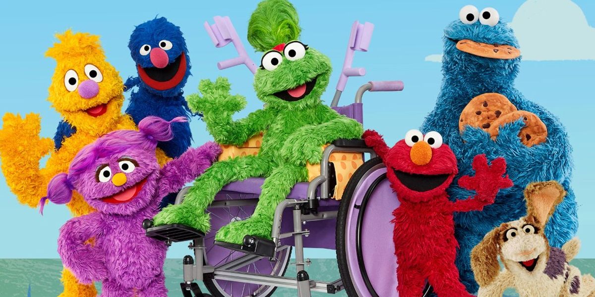 Cadeira de rodas da Vila Sésamo usando Jim Henson Muppet Ameera com Elmo, Grover, Cookie Monster e Cast.