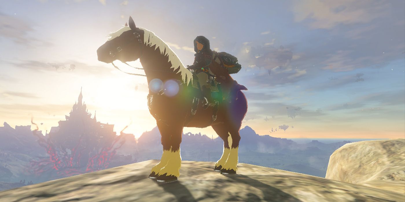 Link riding his horse Epona in front of sunrise in Tears of the Kingdom 
