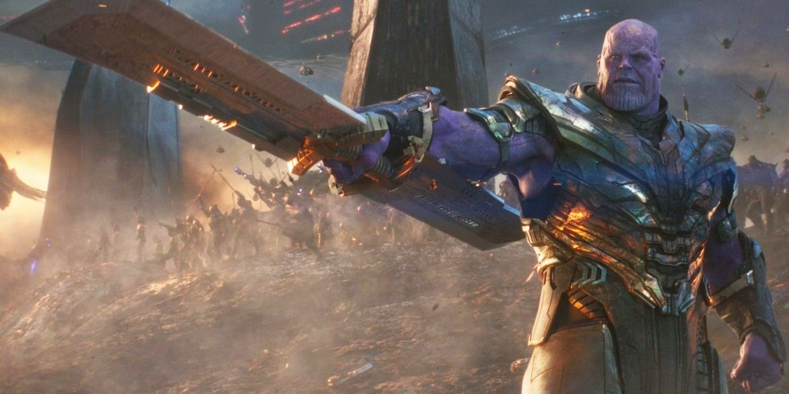Thanos holds out his double-blade in the MCU