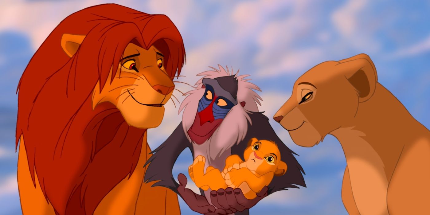 Rafiki holding Simba and Nala's child at the end of The Lion King.