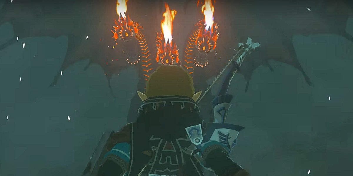 Link olha como um dragão de três cabeças de fogo se prepara para lutar contra ele em The Legend of Zelda Tears of the Kingdom