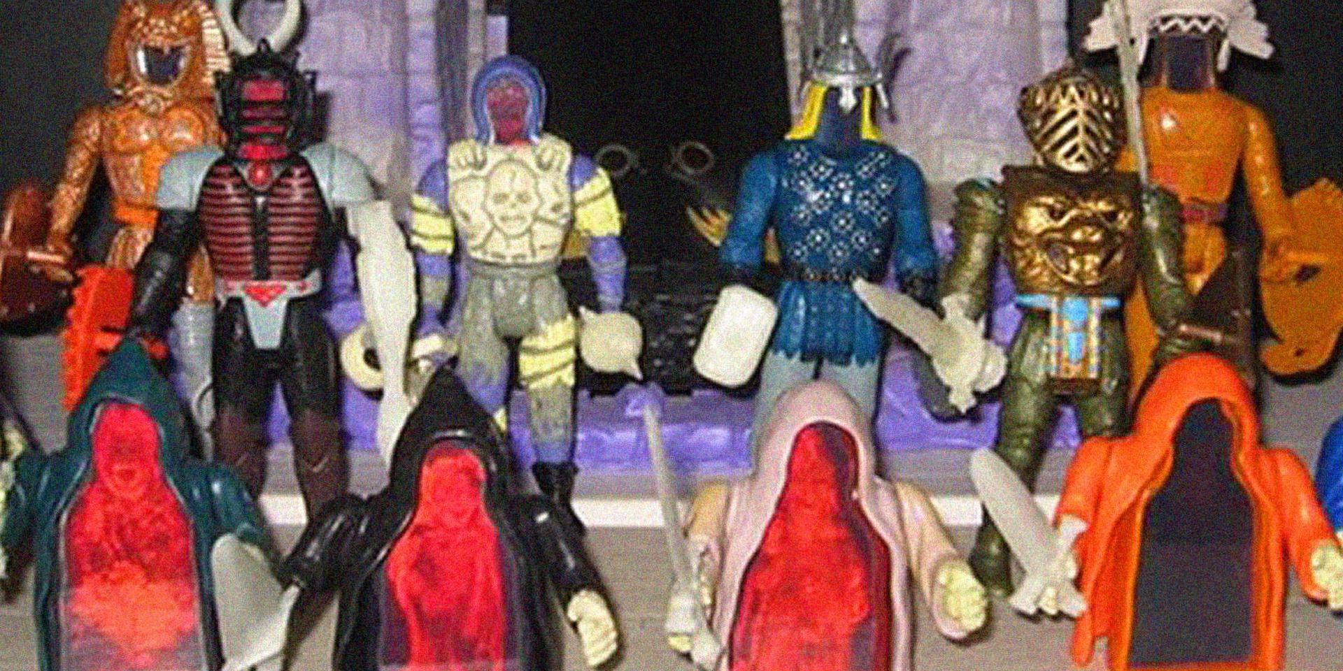 Toys of characters from Super Naturals standing behind spirit figures