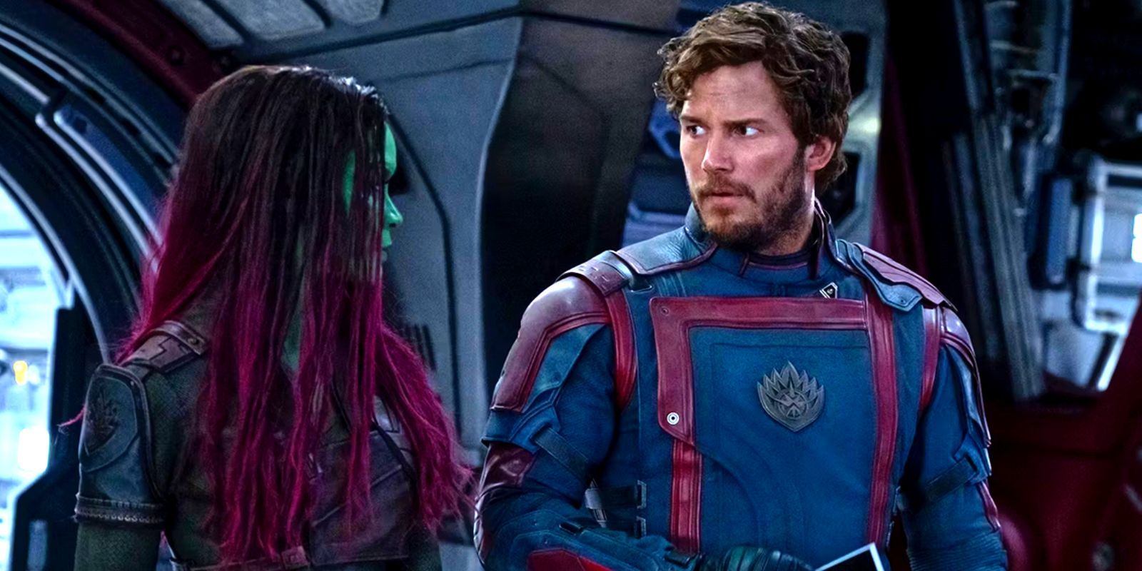 Star-Lord and Gamora share a concerned glance