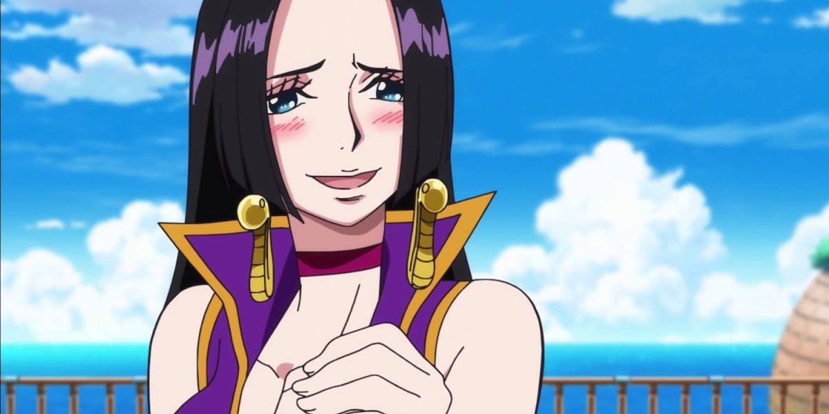 Boa Hancock blushes while talking with the ocean behind her in the One Piece anime