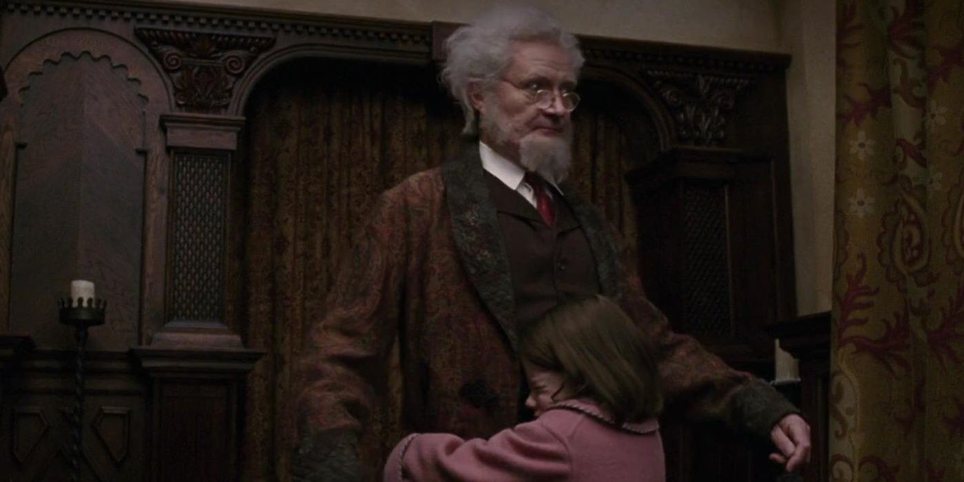 Lucy clings to Professor Digory Kirke in Narnia: The Lion, the Witch and the Wardrobe