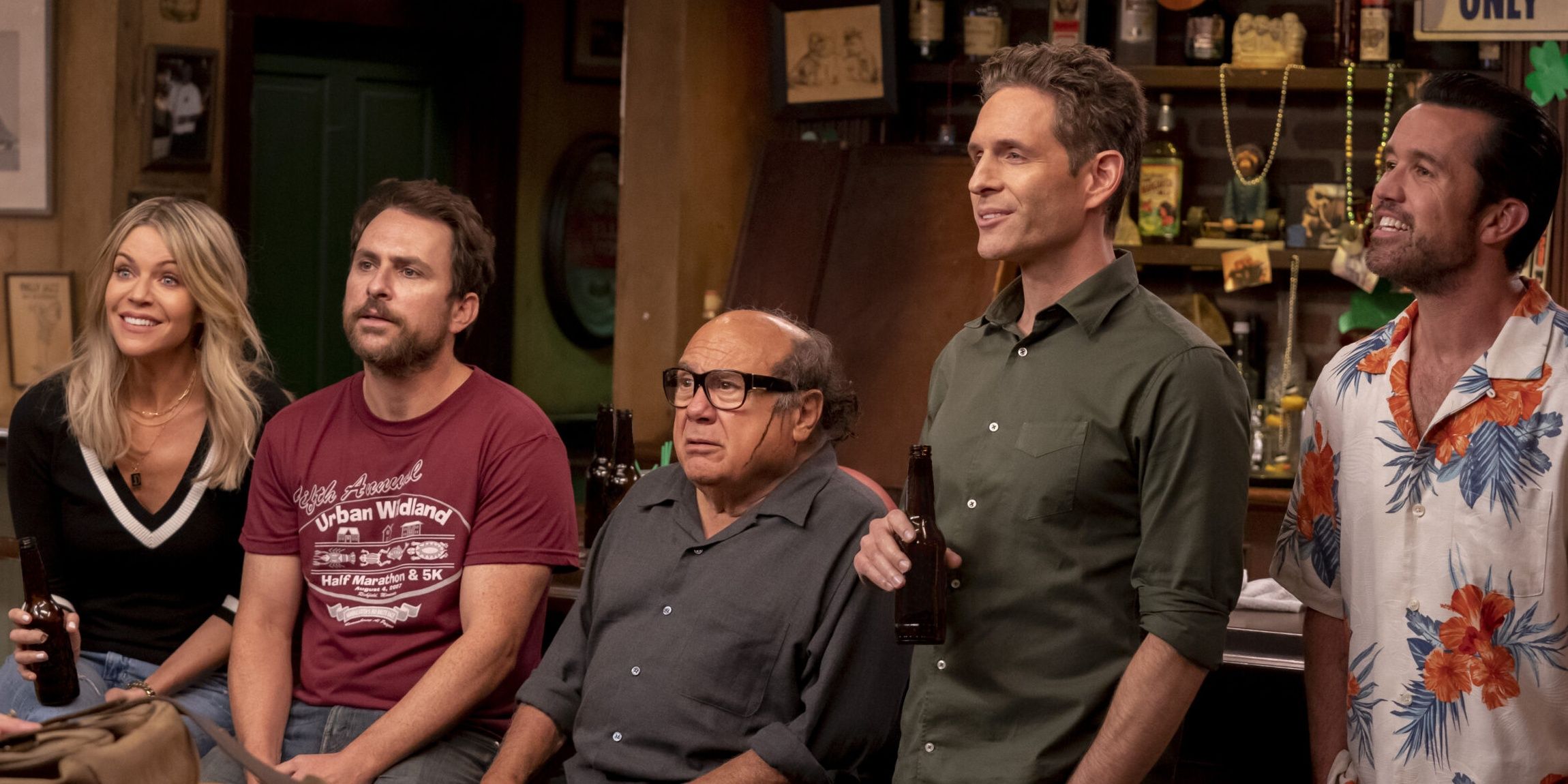 It's Always Sunny in Philadelphia's main characters in front of their bar