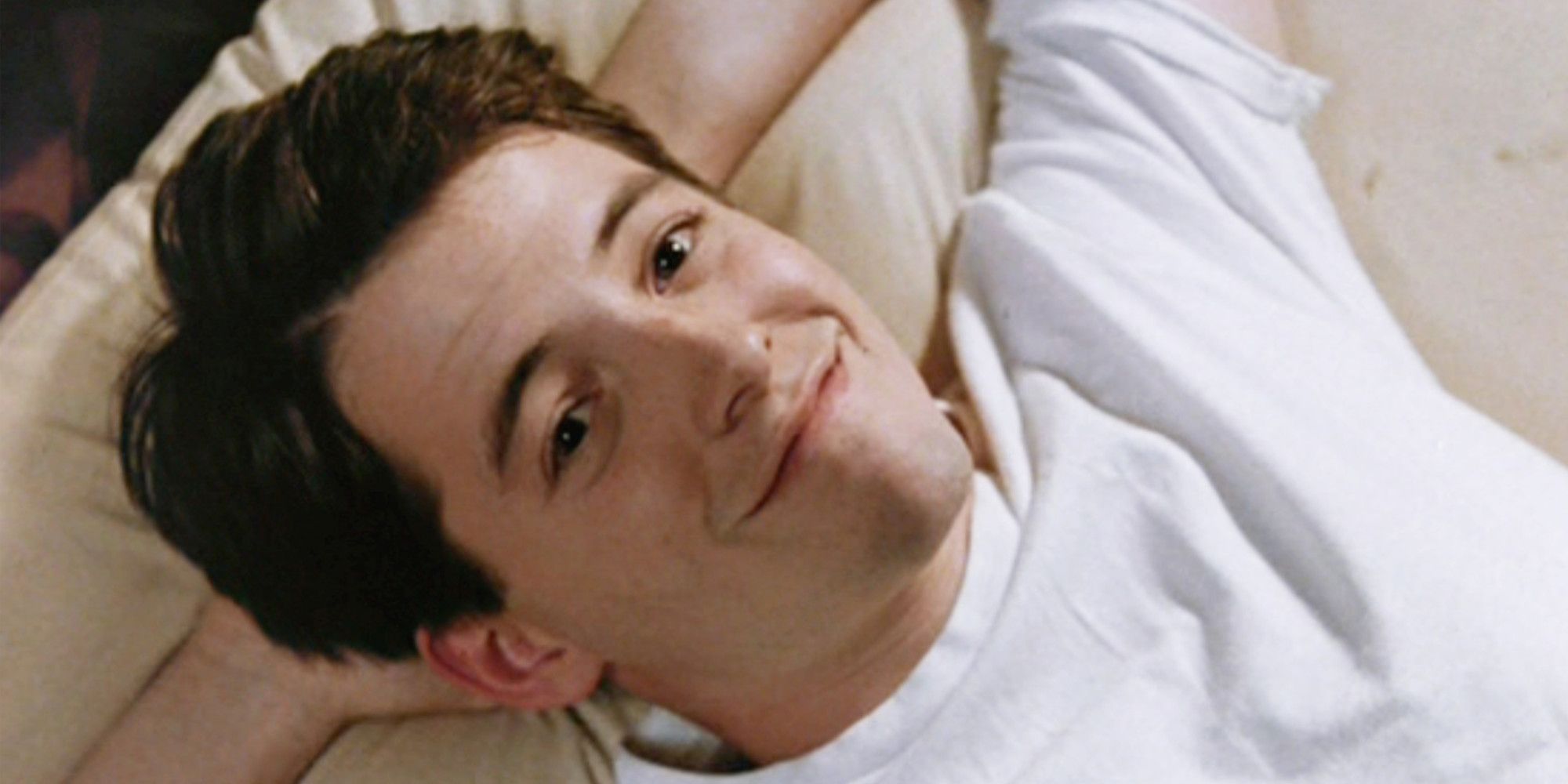 Matthew Broderick smiles mischievously as Ferris Bueller in Ferris Buelle's Day Off