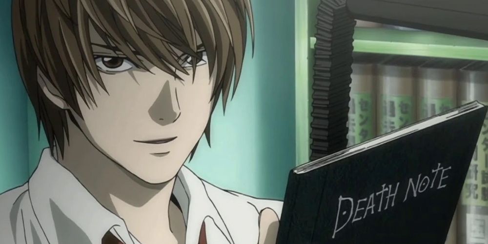 Light Yagami holds the notebook in Death Note