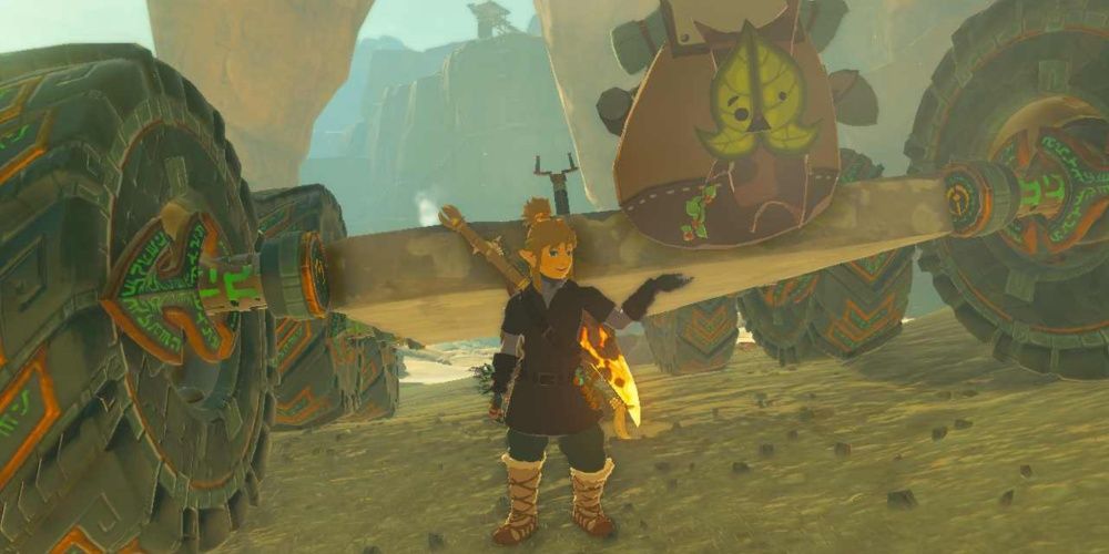 Link exibindo um ornamento de capô korok colado em um ATV em Tears of the Kingdom