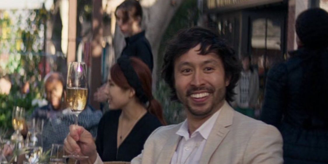 Ryan Bergara raises a glass of champagne in Ant-Man and the Wasp: Quantumania