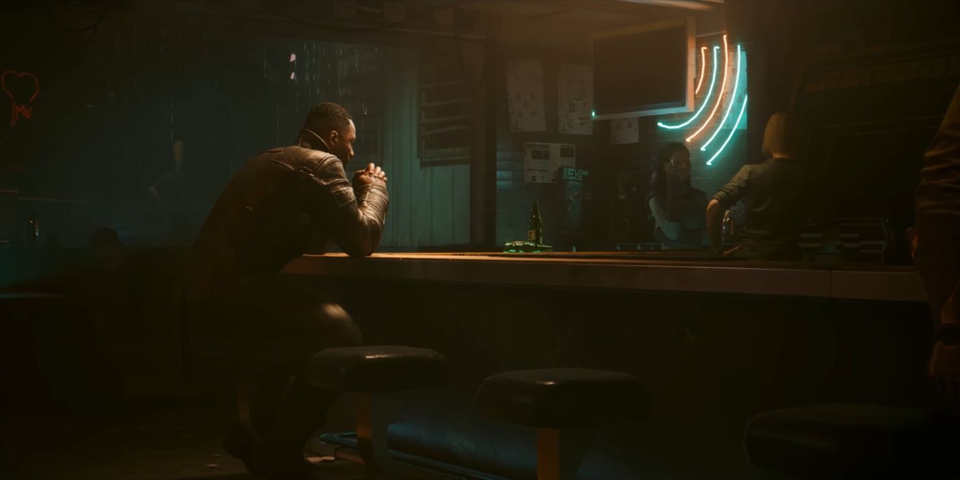 Idris Elba as Solomon Reed sitting at a bar in Cyberpunk 2077: Phantom Liberty.