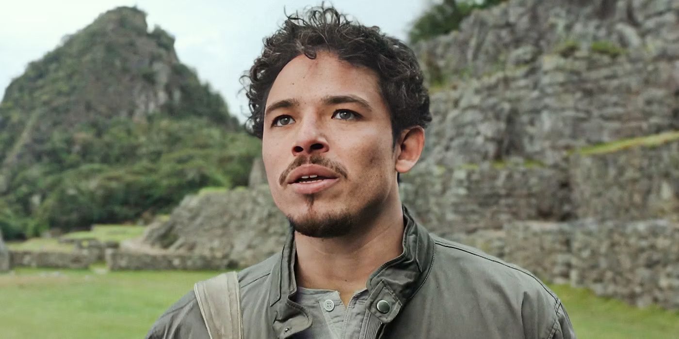 Anthony Ramos as Noah Diaz in Transformers: Rise of the Beasts looking up.