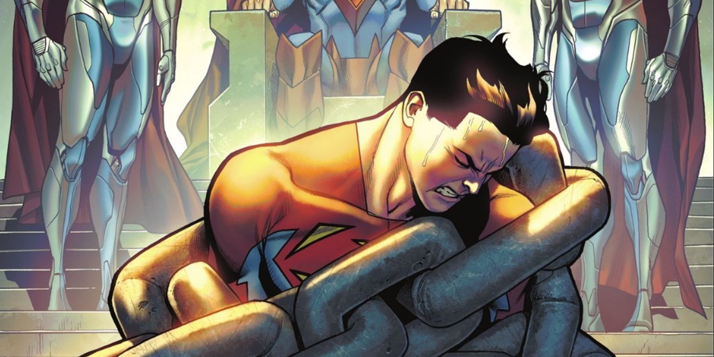 jon kent bound in  massive chains as injustice superman and his androids watch on