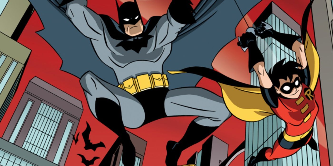 Batman and Robin swinging through the city in Gotham Adventures.