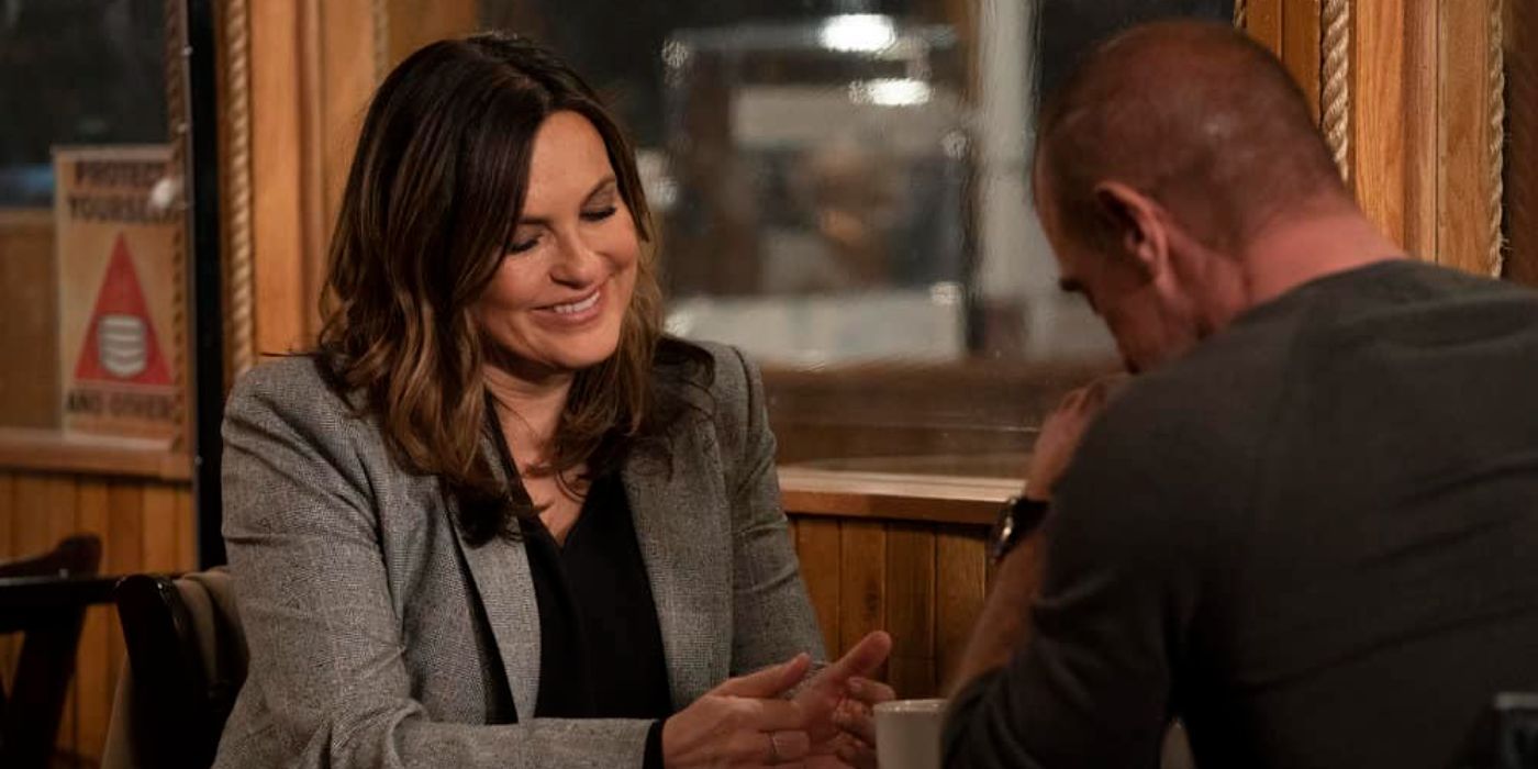 Olivia Benson, played by Mariska Hargitay, smiles at Elliot Stabler, played by Christopher Meloni, on Law & Order: SVU