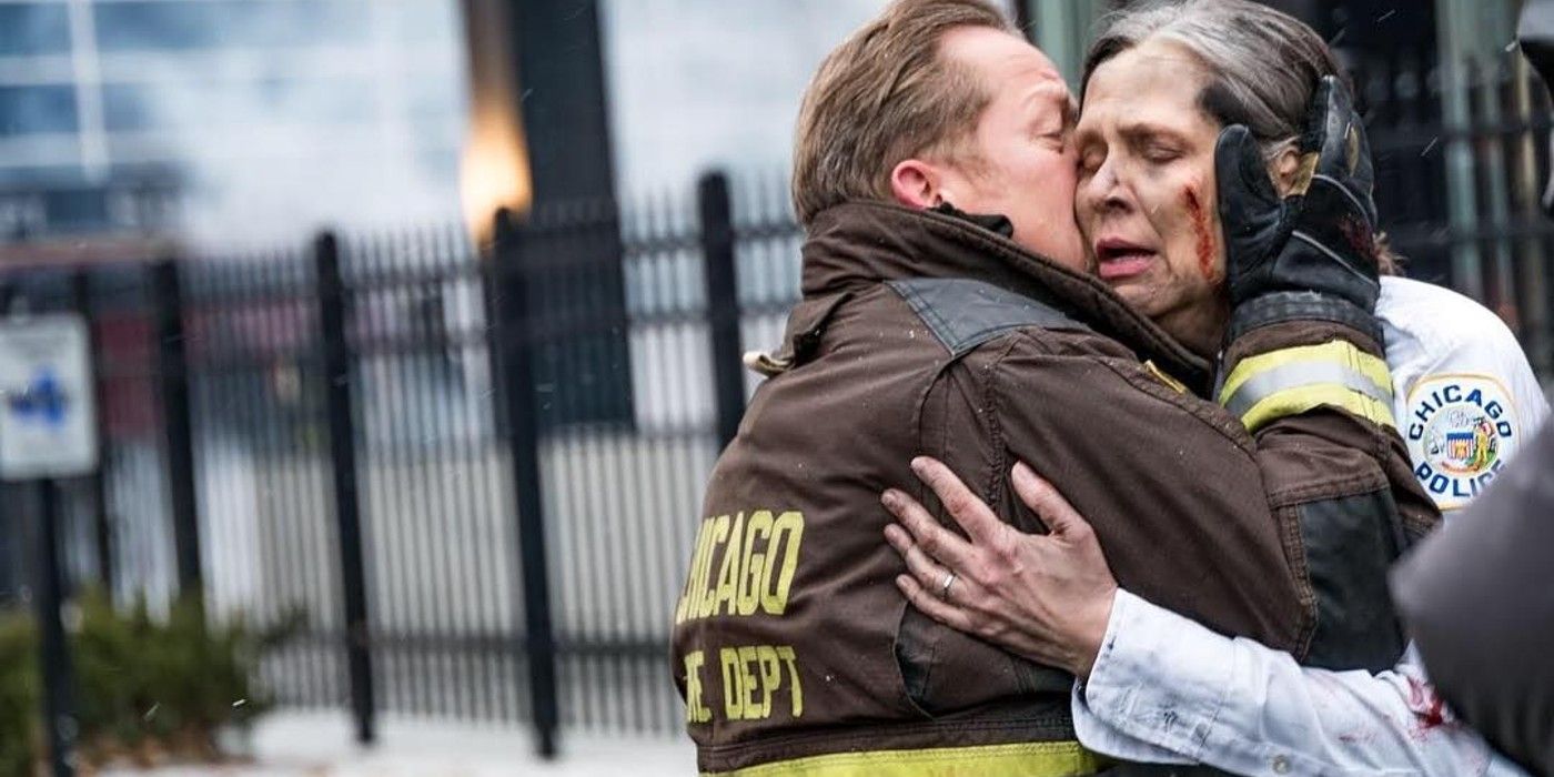 Trudy and Mouch embrace after her escape from a burning building in Chicago PD