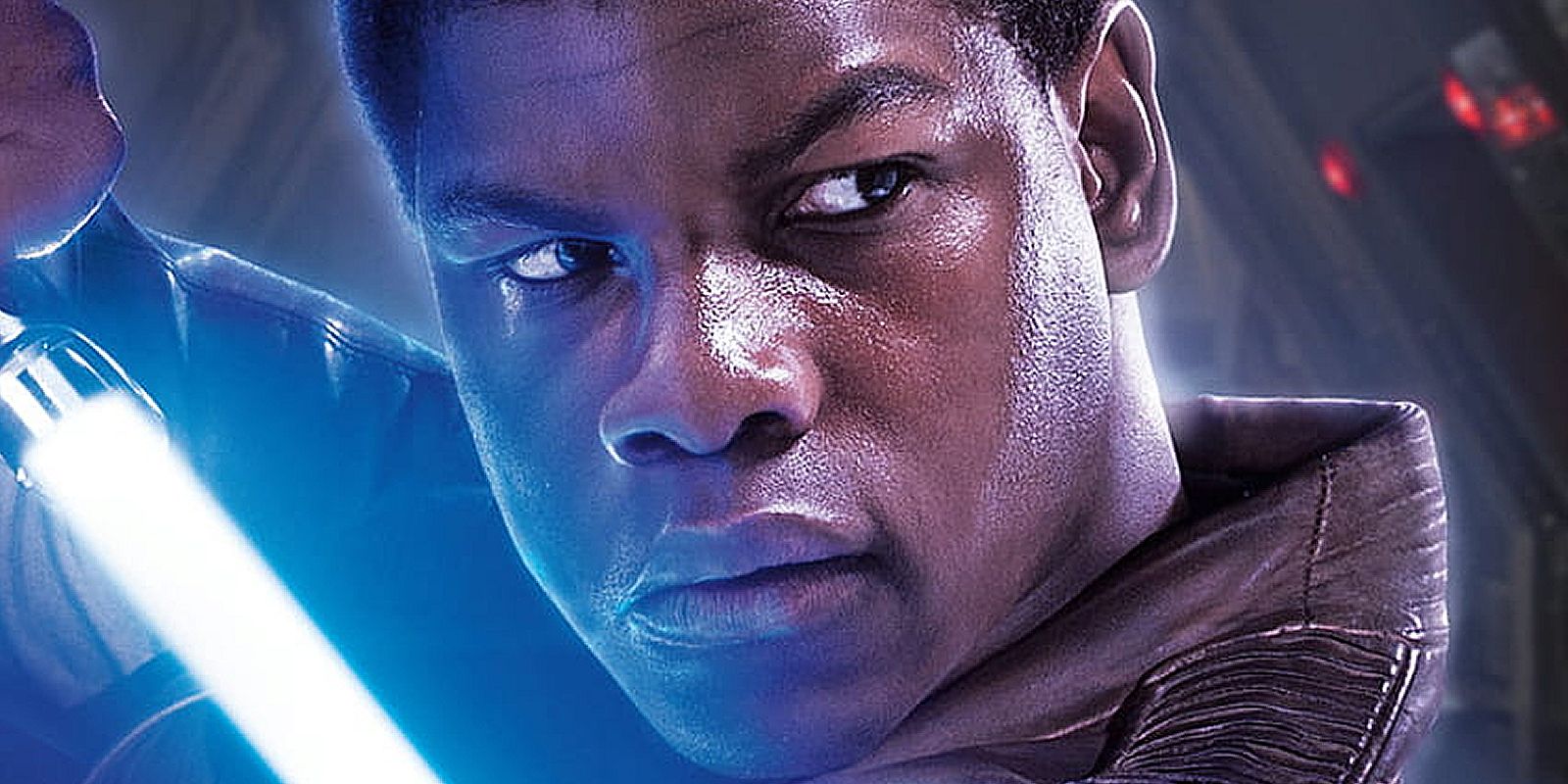 Finn with a blue lightsaber in Star Wars The Force Awakens