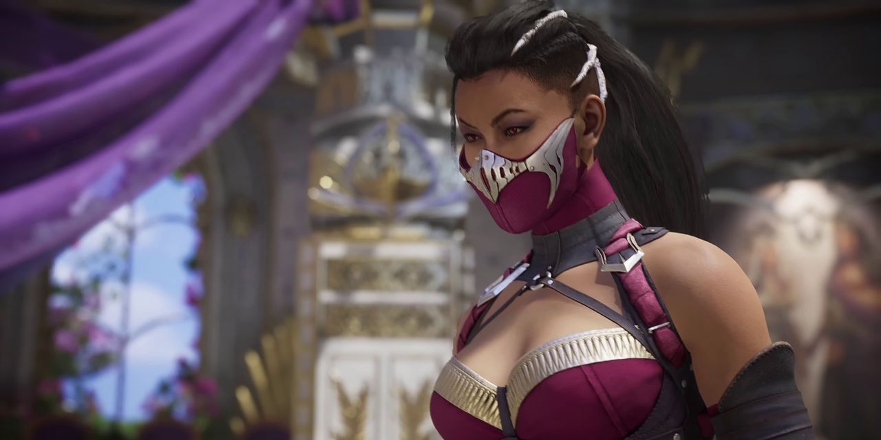 Mileena looks down before removing her mask in Mortal Kombat 1 video game