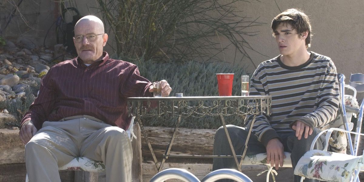 Walter and Flynn drinking tequila in their backyard in Breaking Bad