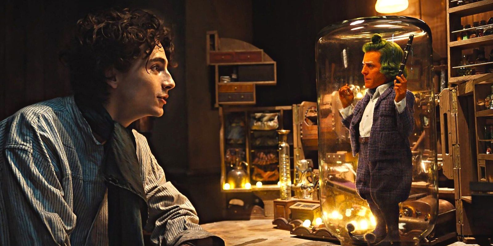 Willy Wonka staring at an Oopma-Loompa in a jar in Wonka