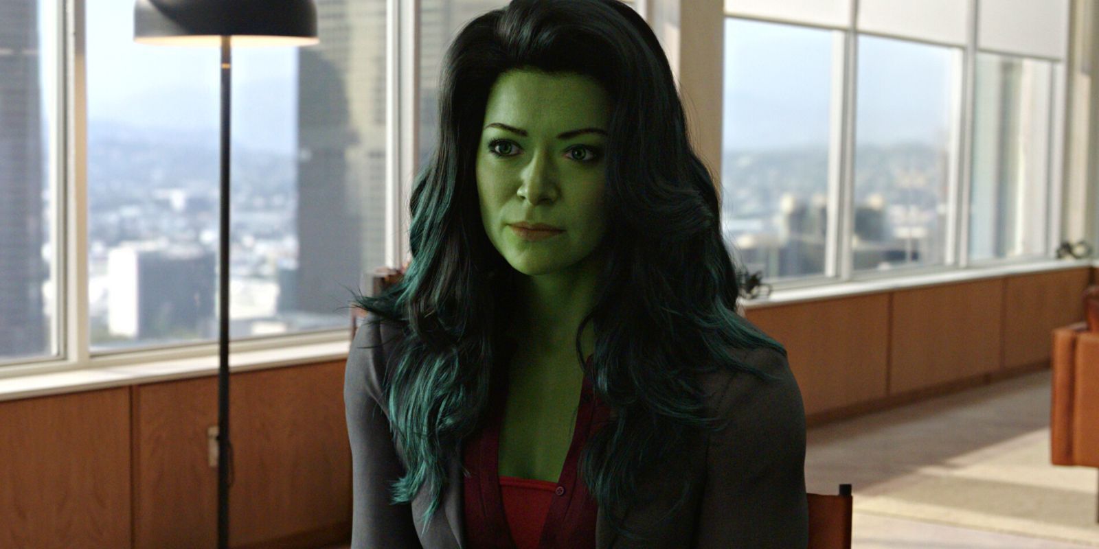 She-Hulk sitting at her desk.