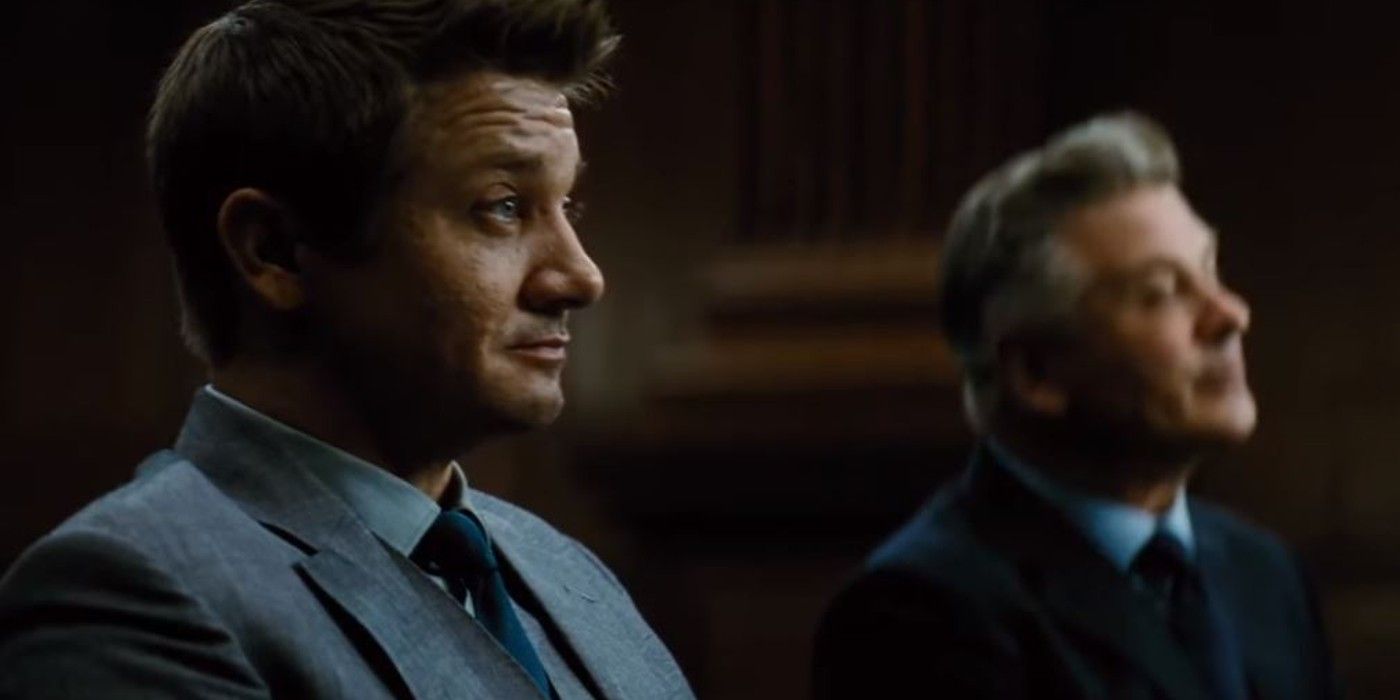 William Brandt (Jeremy Renner) sits with Alan Hunley (Alec Baldwin) during a hearing in Mission Impossible, Fallout