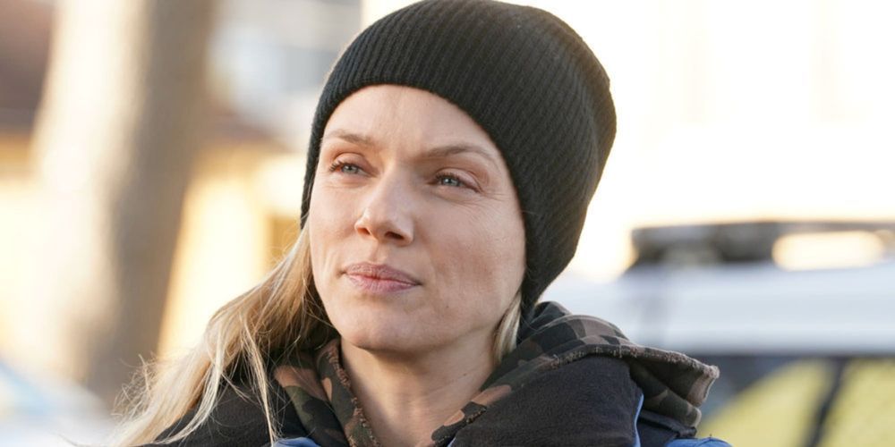 Hailey Upton, played by Tracy Spiridakos, stands outside in a beanie on Chicago P.D.