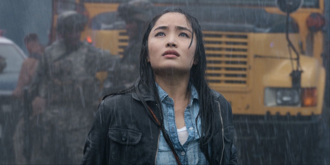 Monarch Godzilla Apple TV+ Show - Anna Sawai as Cate standing in the rain