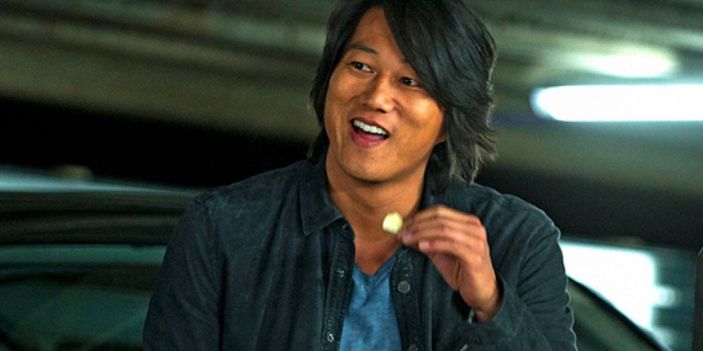 Han Lue (Sung Kang) eats a snack in fast & Furious