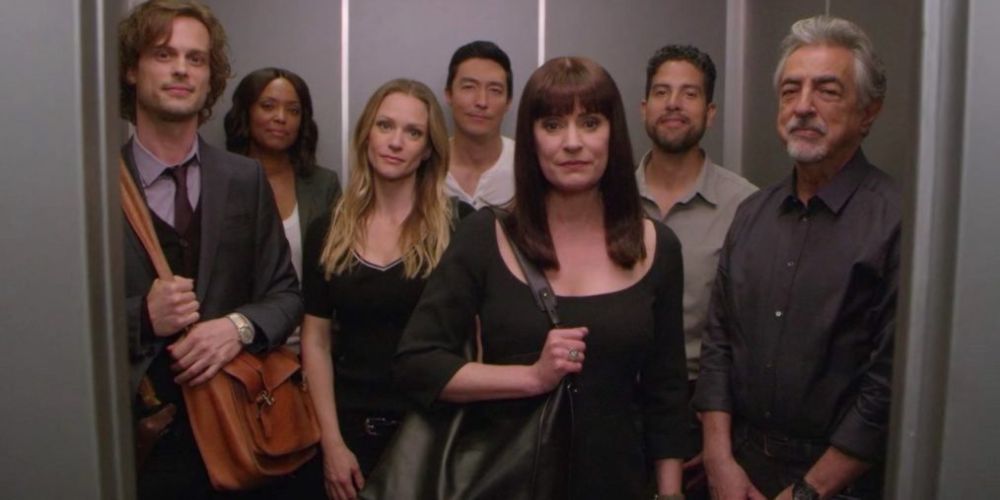 Most of the cast of Criminal Minds standing in an elevator with Emily Prentiss